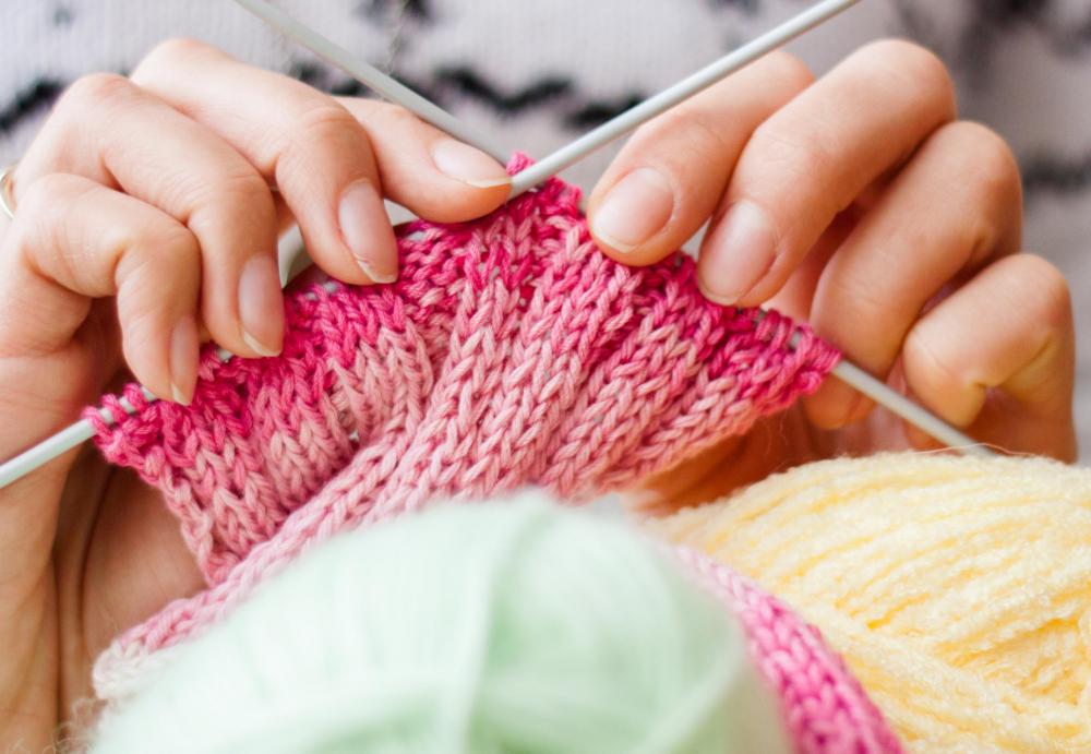 Person knitting with needles