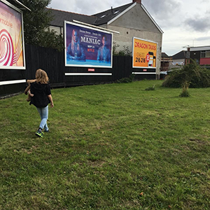 Child running in the St Mary's Community Garden