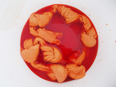 Tie dying fabric orange